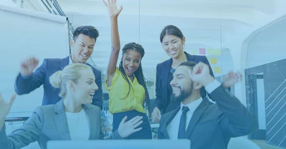 group of coworkers displaying enthusiasm